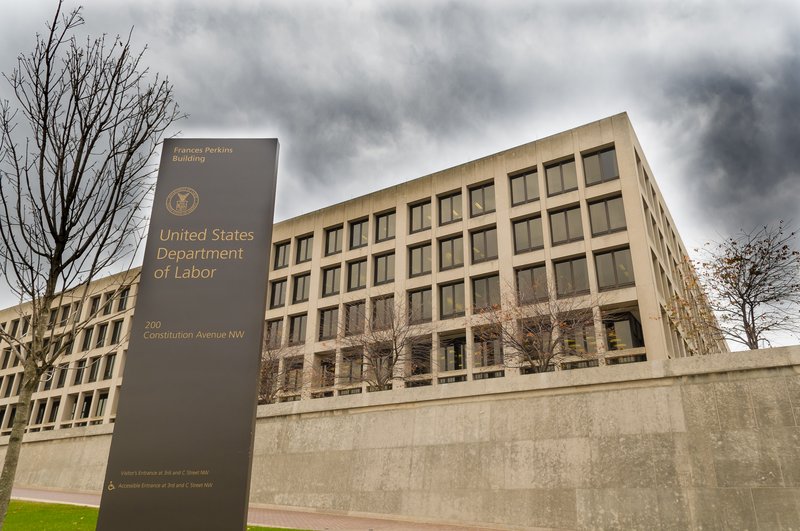 The exterior of the Frances Perkins Building, the headquarters of the US Department of Labor, on a cloudy day in Washington, DC.