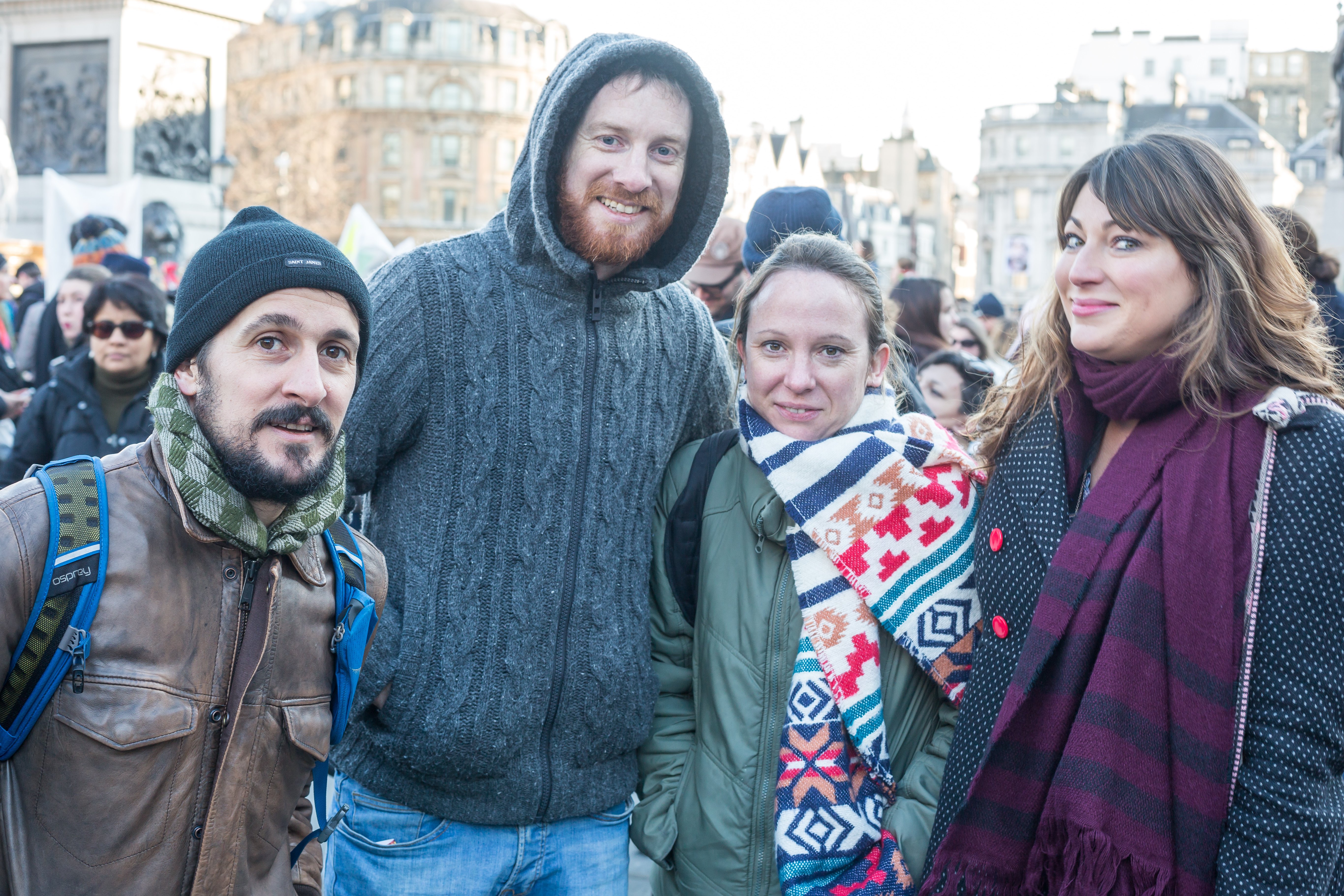 women and men at a women's march