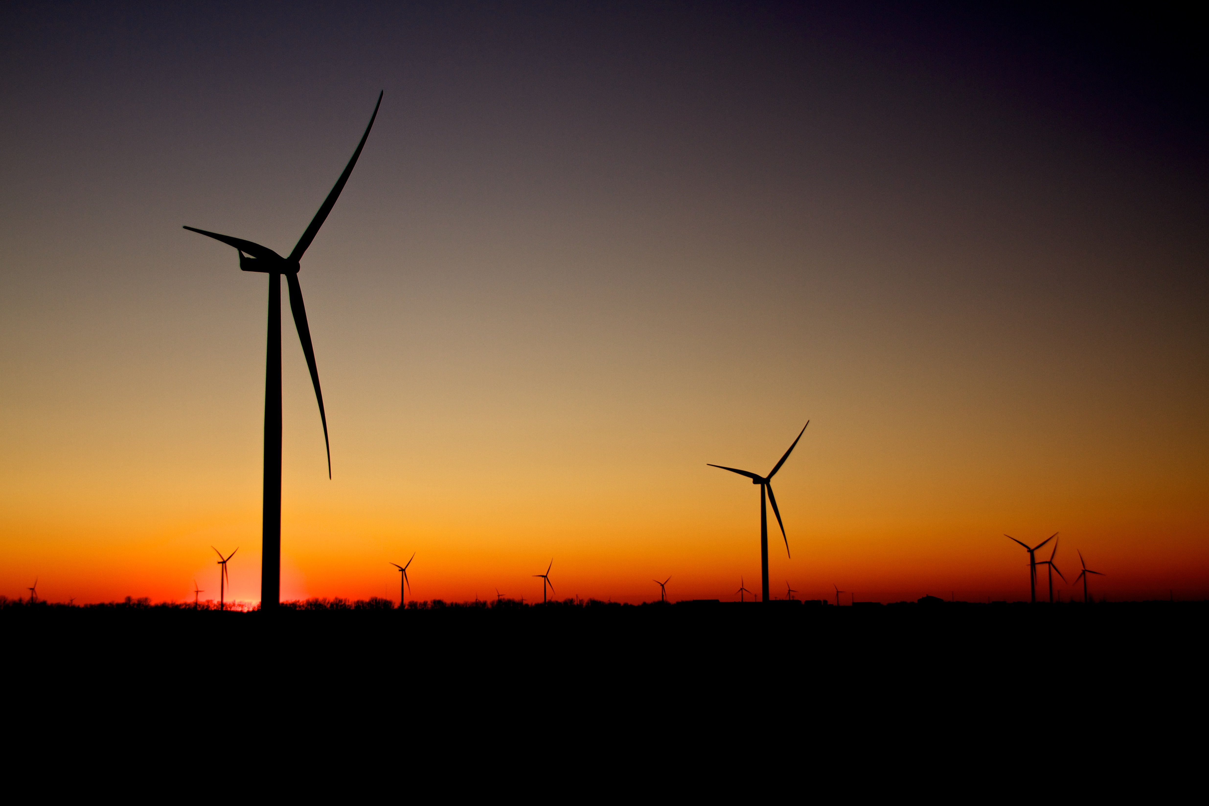 Wind turbines at sunset