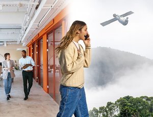 Composite image of a modern office and an outdoor scene with a woman on a phone, a satellite, and a telecommunications tower.