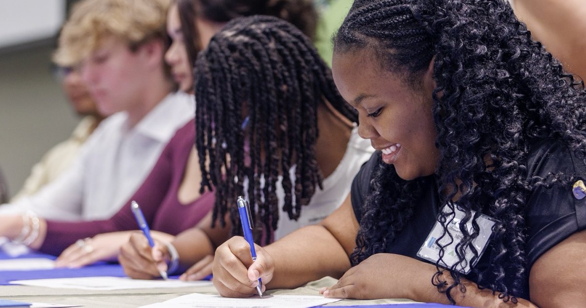 youth apprentice signing photo