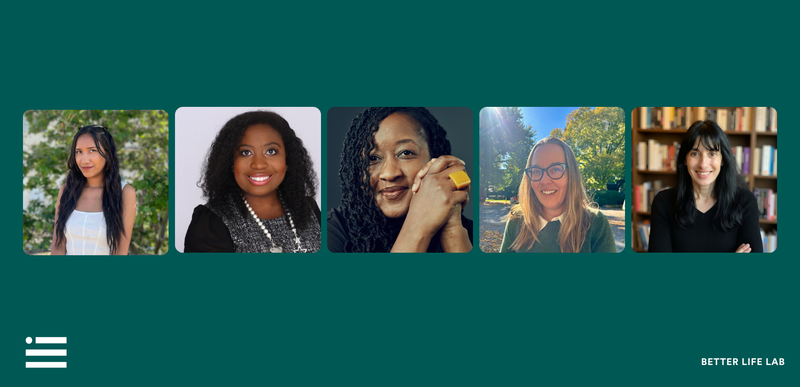 Hand holding a pen and writing in a notebook