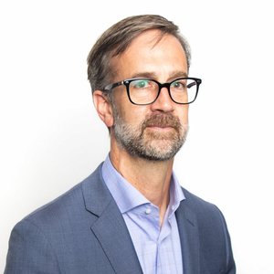 Headshot of Kevin Carey