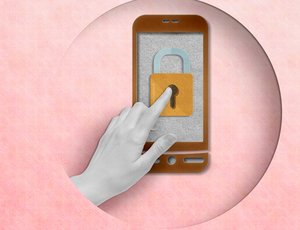 A hand taps on a lock on a phone.