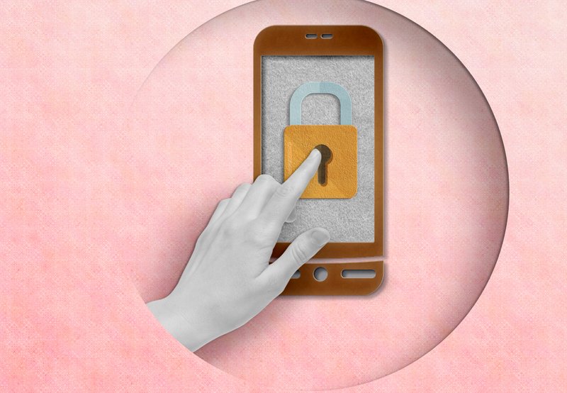 A hand taps on a lock on a phone.