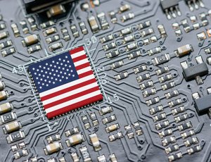 A flag of the United States sits in a chip used for AI technology.