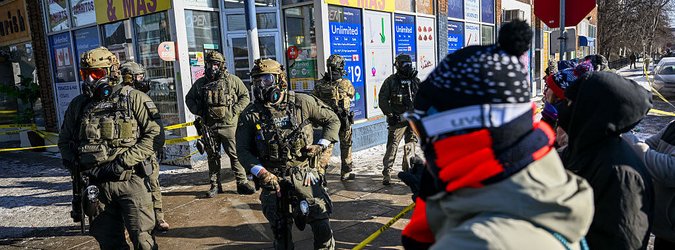 Crowds of onlookers gather after federal agents shot Alex Pretti on January 24, 2026 in Minneapolis, Minnesota.