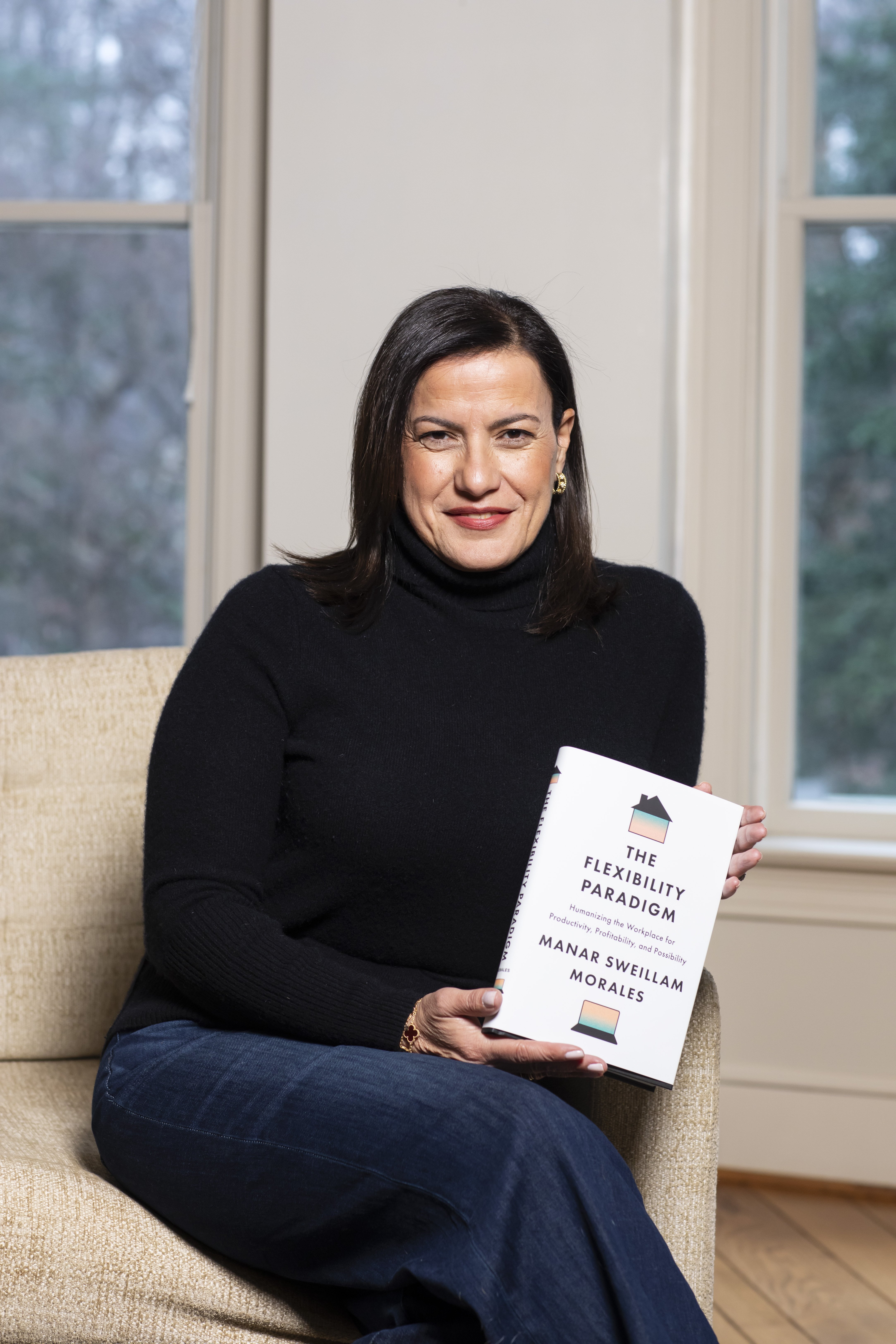 Manar Morales with her new book, The Flexibility Paradigm