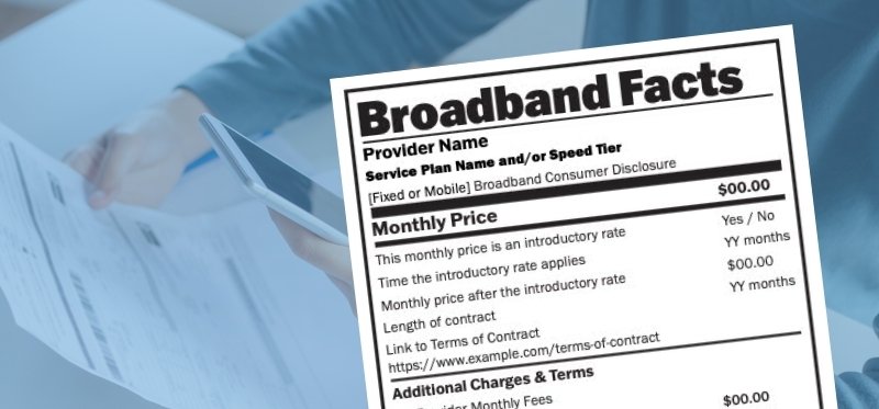 Broadband Nutrition Label overlayed on an image of someone working on their phone