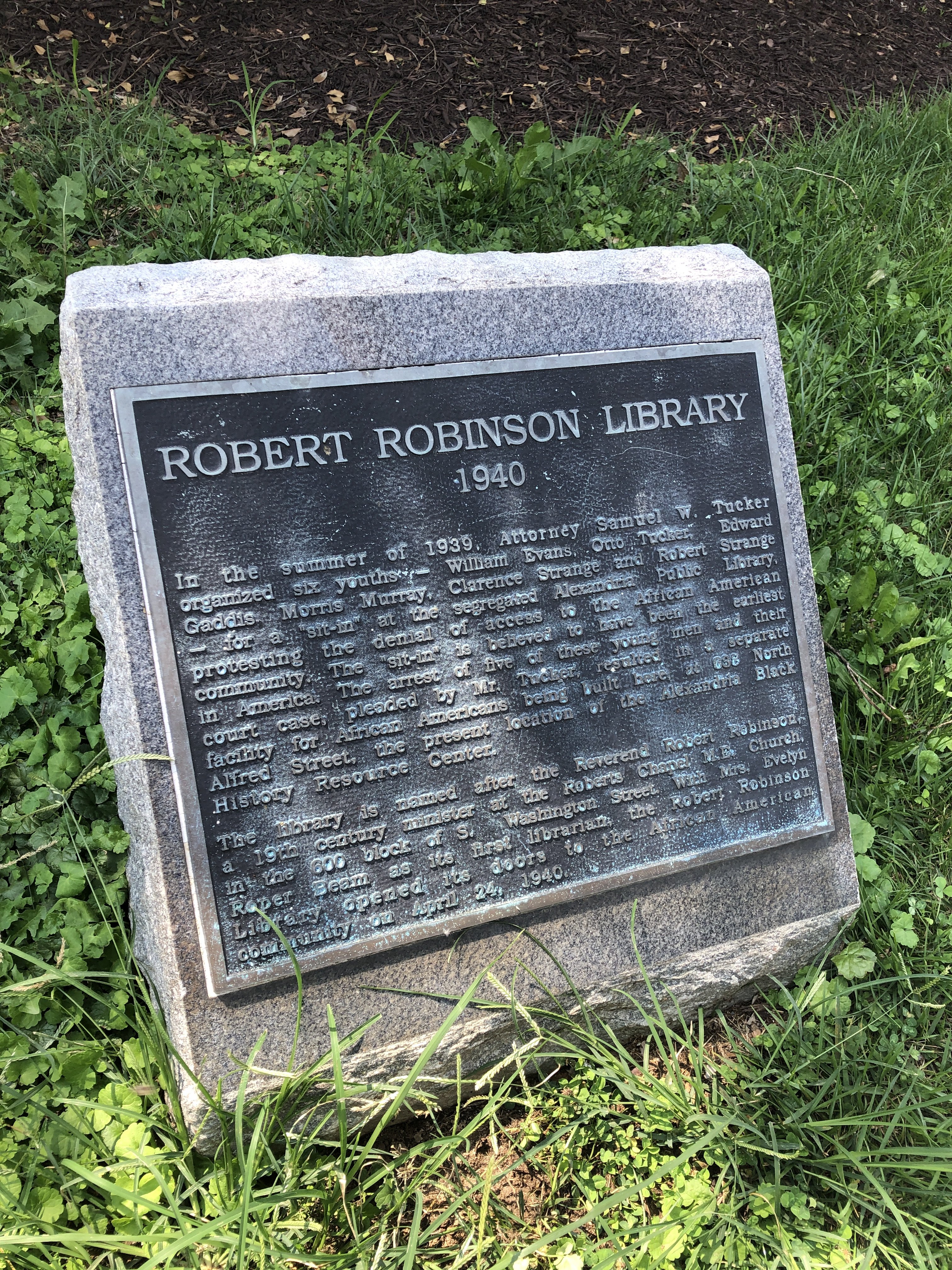 Photo of stone marker near Alexandria Black History Museum