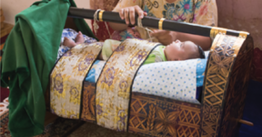 Baby in gahvora cradle