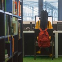Student in library studying