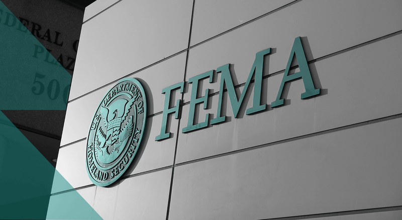Sign on a building reads FEMA next to the agency's logo.