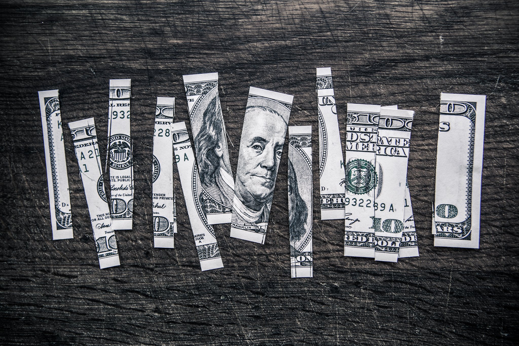 dollar bill cut up debt