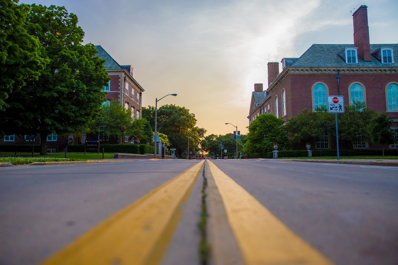 image of a road to red brick campus