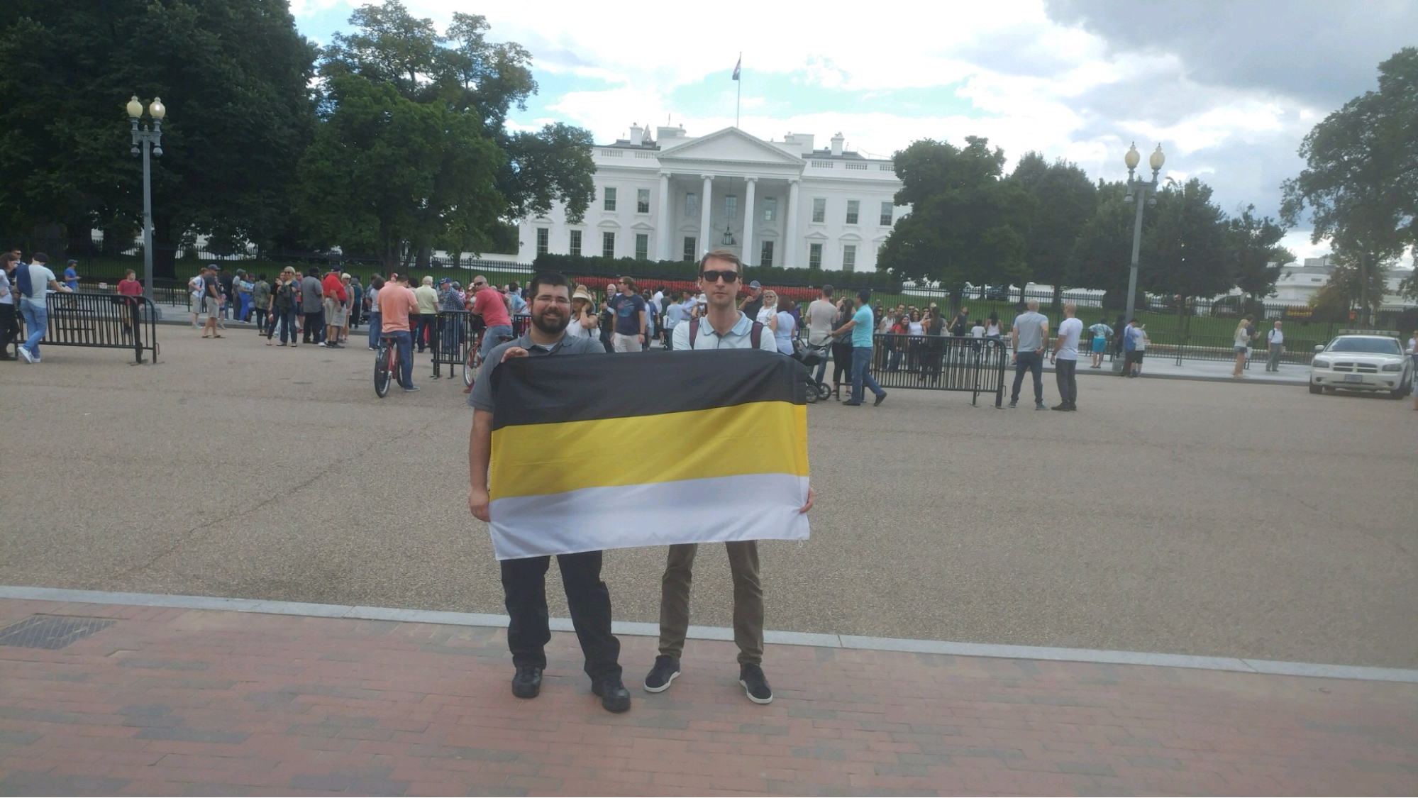 Stanislav Shevchuk (right) poses with Unite the Right organizer Matthew Heimbach (left) outside the White House in 2017.
