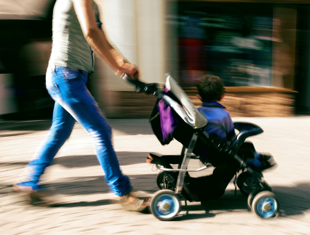 work woman child stroller