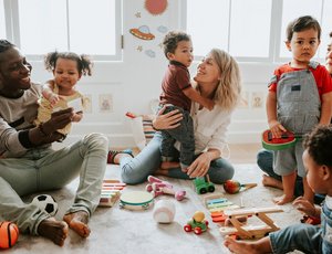 Children and parents playing