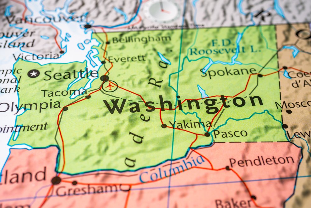 Geographic map showing the state of Washington in yellow with black letters.