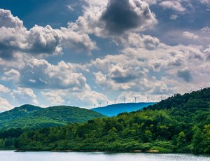 Lake and windmills on a mountain ridge in the rural Potomac Highlands of West Virginia