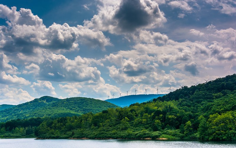 Lake and windmills on a mountain ridge in the rural Potomac Highlands of West Virginia