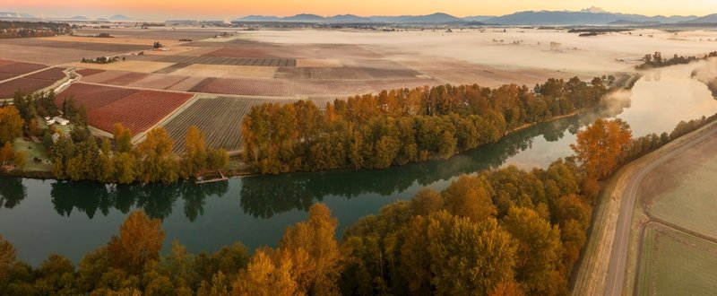 "Aerial view of the Skagit River Valley during a beautiful and dramatic autumnal sunrise." - via Shutterstock