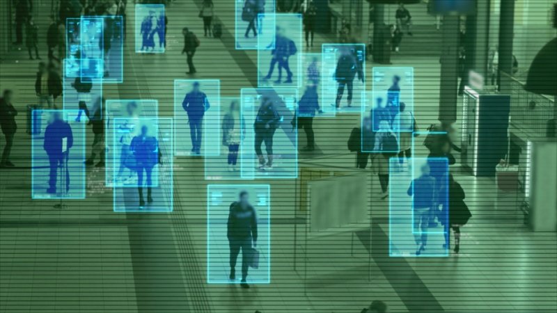 People walking around with squares surrounding them denoting something is tracking them.