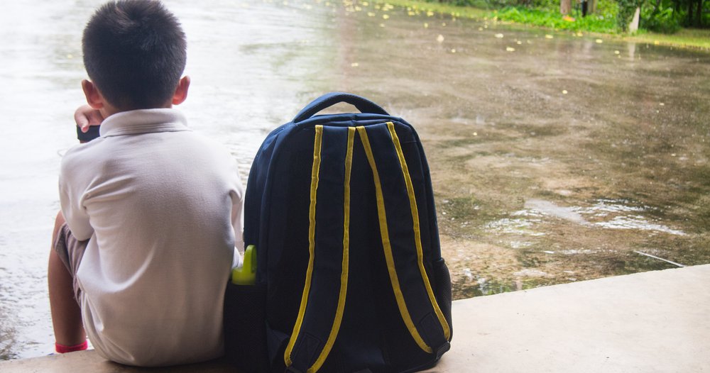 student with backpack