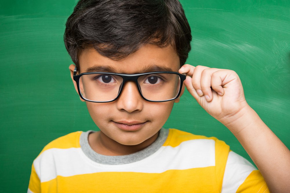 Hispanic child with glasses