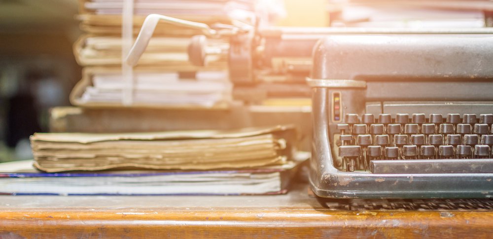 typewriter and papers