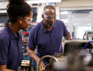 two manufacturing workers